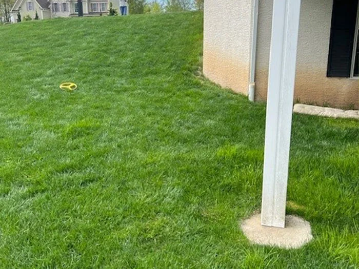 Residential hardscape creation with under deck and subsurface drainage renovation, landscape creation and low voltage lighting addition project in Jamison, PA